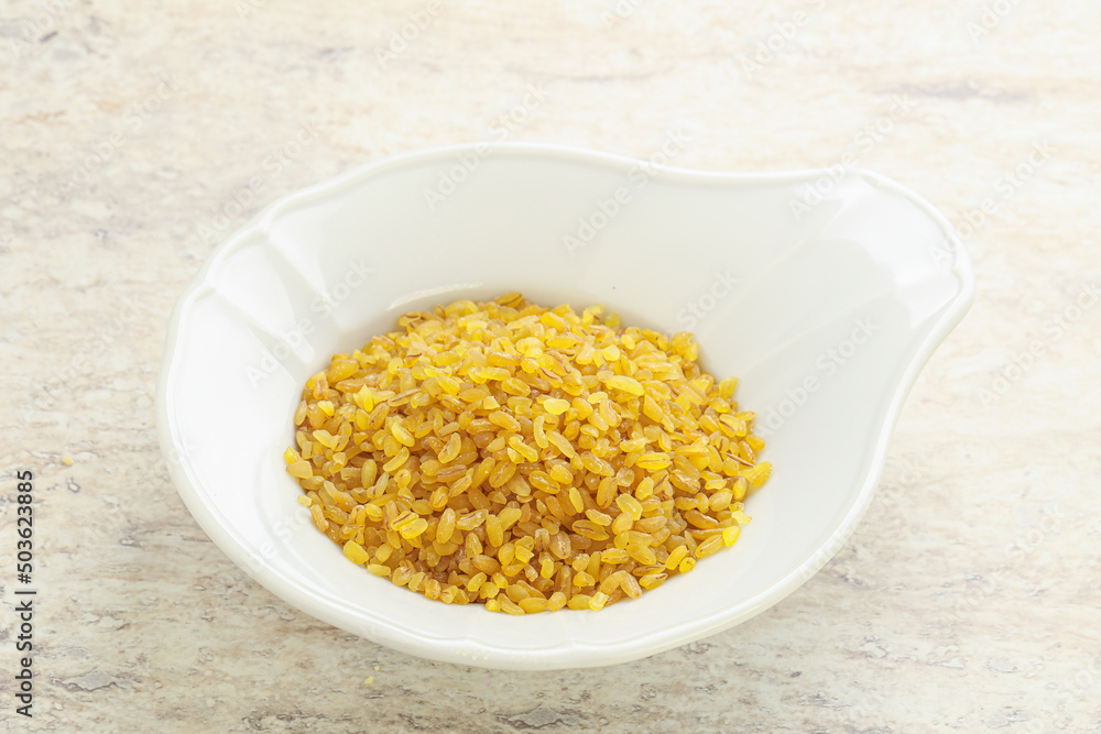 Raw bulgur in the bowl Raw bulgur in the bowl