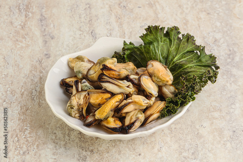 Tasty marinated mussels in the bowl