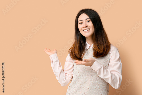Inviting young Asian woman ...
