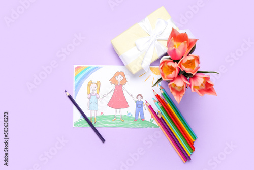 Picture with pencils, tulips and gift on lilac background. Mother's Day celebration
