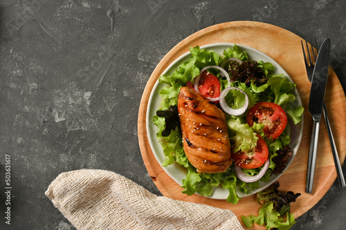 Chicken fillet or chicken breast with organic fresh vegetables salad