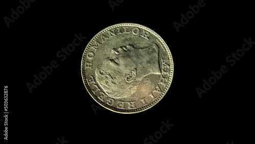 Rotating obverse of Romania coin 200 lei 1942 with inscription meaning MIHAI I THE KING OF ROMANIANS. Isolated in black background. photo