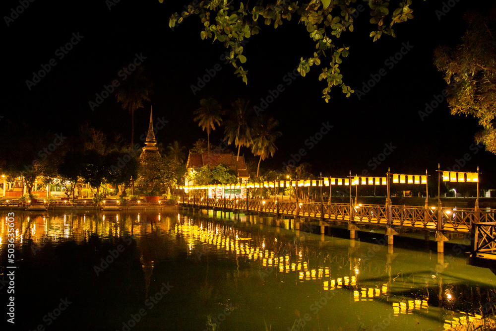 Wat Traphang Thong temple at night in Sukhothai historical park, Thailand Wat Traphang Thong temple at night in Sukhothai historical park, Thailand