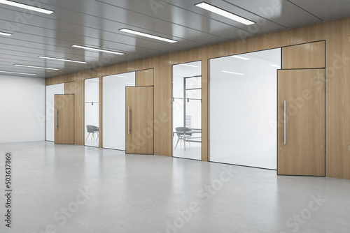 Foto Bright wooden and concrete office hallway interior with windows, city view, furniture, glass partition and daylight