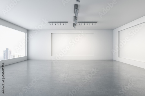 SImple empty concrete gallery interior with window and city view, mock up place on walls and daylight. Museum concept. 3D Rendering.