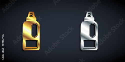 Gold and silver Plastic bottle for laundry detergent, bleach, dishwashing liquid or another cleaning agent icon isolated on black background. Long shadow style. Vector