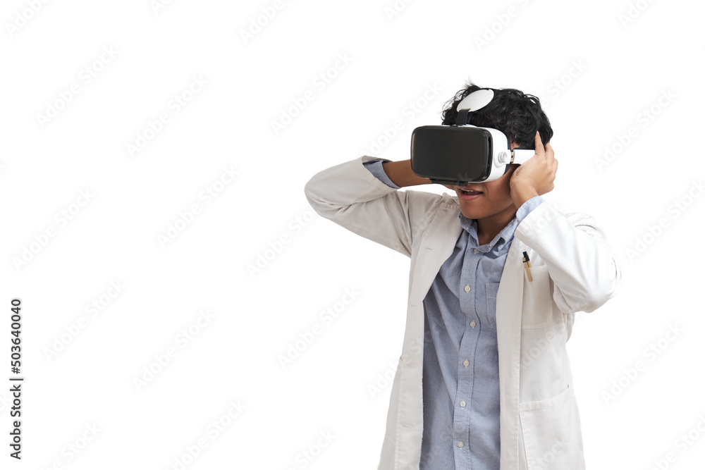 Young peruvian male scientific using virtual reality headset. Isolated over white background. Young peruvian male scientific using virtual reality headset. Isolated over white background.