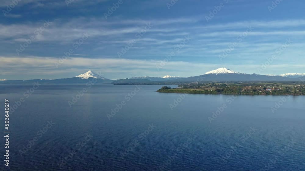 Aerial view truck left of Lake Llanquihue with the Calbuco and Osorno volcanoes in the background. Aerial view truck left of Lake Llanquihue with the Calbuco and Osorno volcanoes in the background.