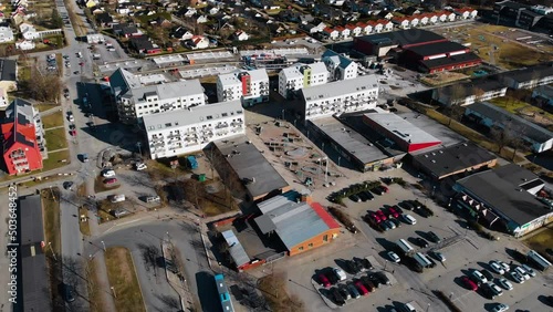 Sunny Day In Residential Area In Vastra Gotaland. Grabo Square Near Gothenburg In Sweden. aerial drone pullback photo