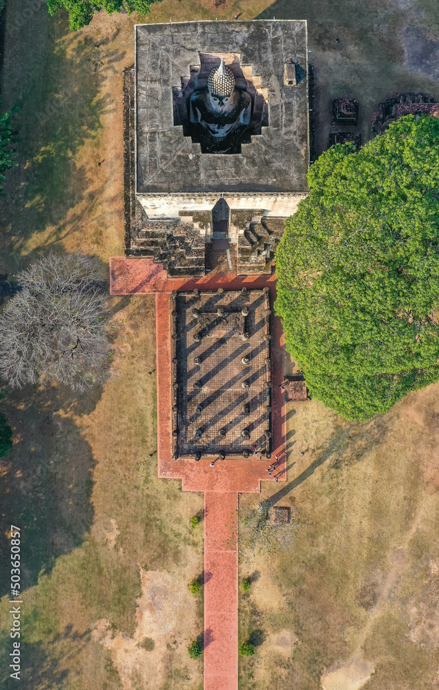 Wat Si Chum temple and big Buddha in Sukhothai historical park, Thailand