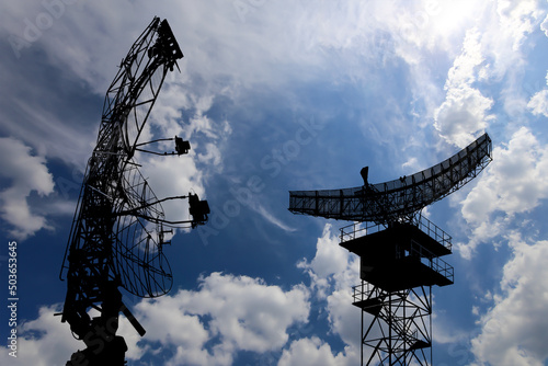 Air defense radars of military mobile anti aircraft systems, modern army industry on background beautiful clouds and sky, Russia