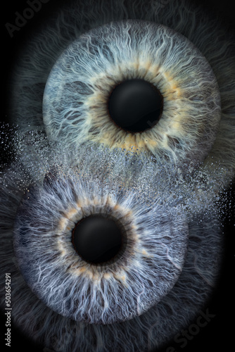photo of two eyes taken in macro mode, different persons, same color and simulating collision