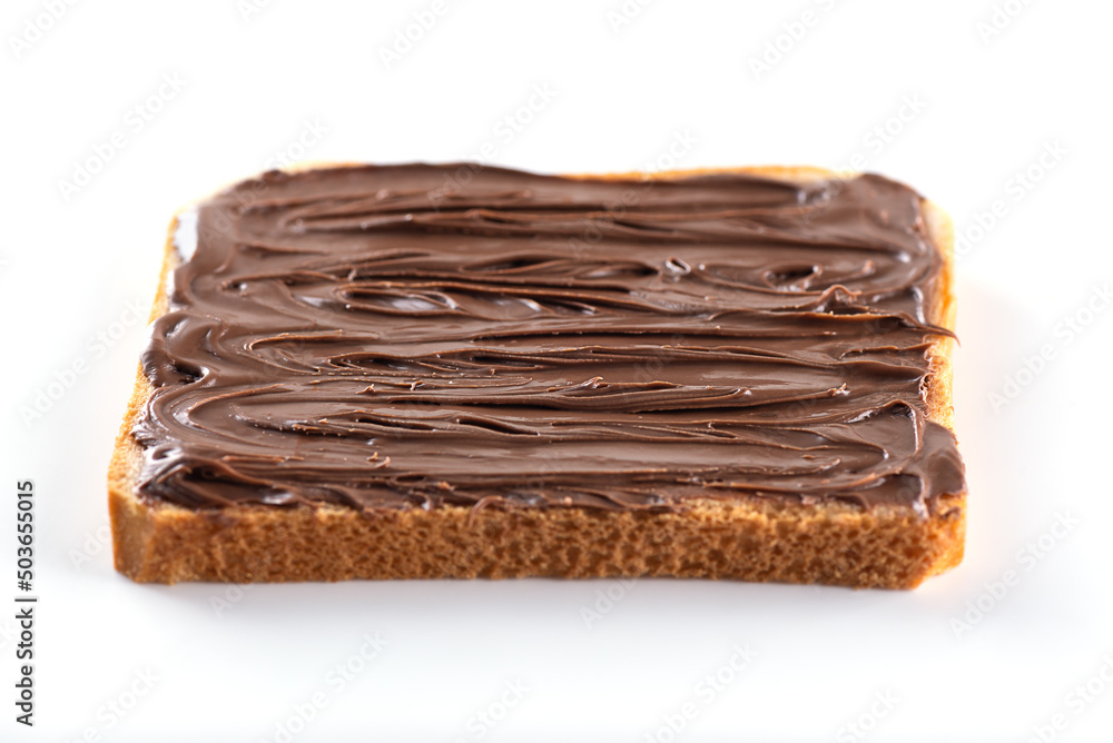 Slice of toast bread with chocolate hazelnut paste isolated on white background. Selective focus. Slice of toast bread with chocolate hazelnut paste isolated on white background. Selective focus.