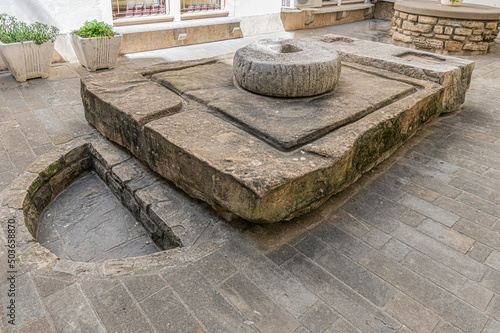 Ancient press for making wine or olive oil in fewish quarter in Piran, Slovenia