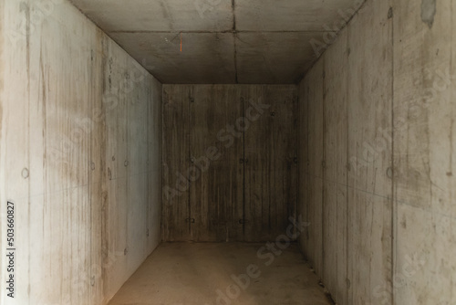 empty room with concrete walls