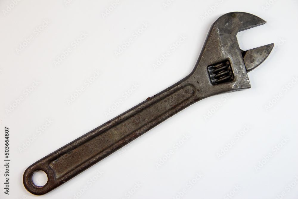 Adjustable wrench isolated on the white background Adjustable wrench isolated on the white background