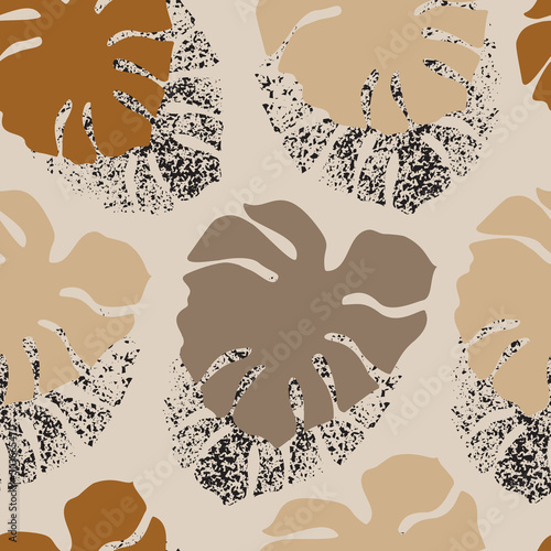 Tropical seamless pattern with grunge monstera leaves silhouette