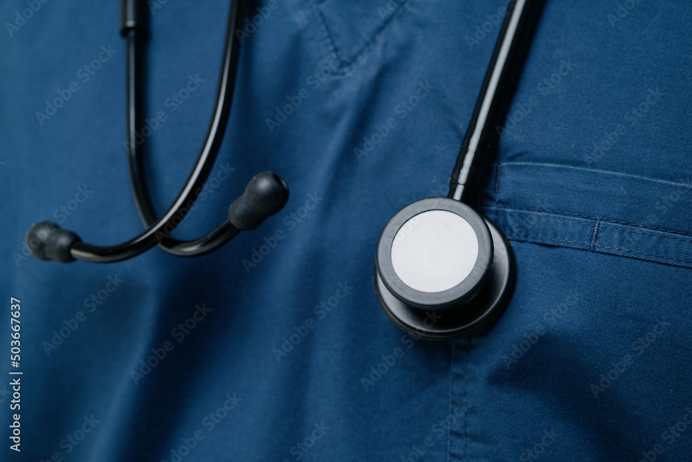 Medical stethoscope. Black medical stethoscope.A doctor with a stethoscope.A doctor holding a stethoscope Medical stethoscope. Black medical stethoscope.A doctor with a stethoscope.A doctor holding a stethoscope
