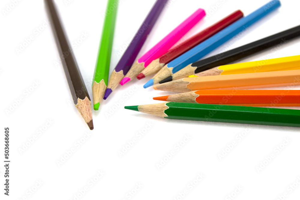 isolated colored pencils on a white background