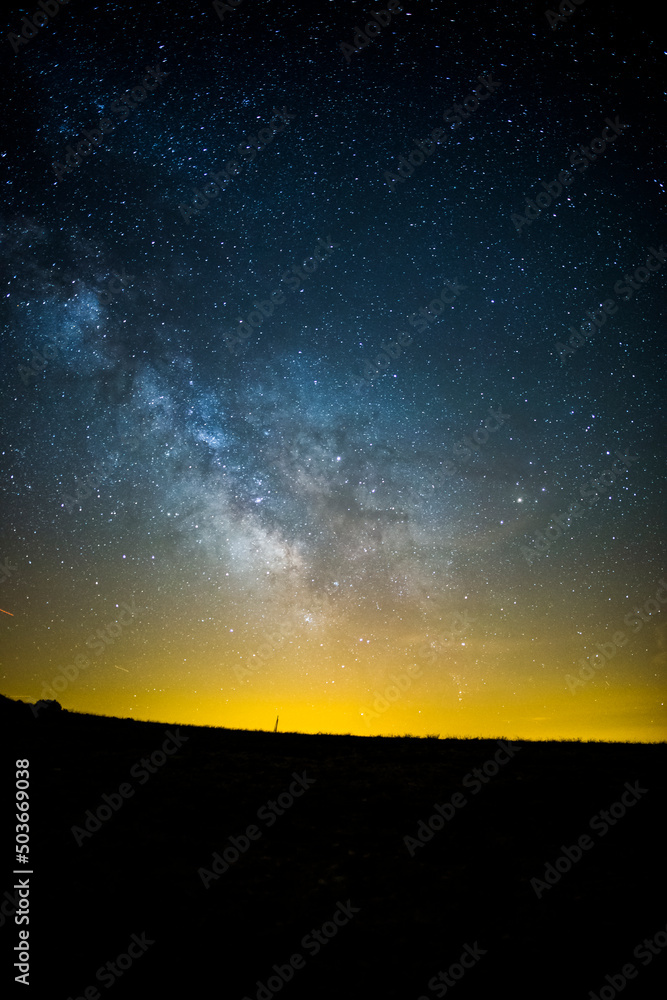 Milky way and couple in Serra Del Montsec, Lleida, Spain Milky way and couple in Serra Del Montsec, Lleida, Spain