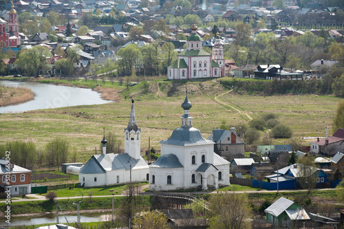 Beautiful churches of Suzdal city in rural landscape, Russia photo