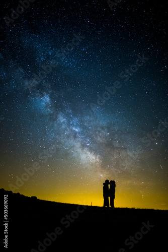 Milky way and couple in Serra Del Montsec  Lleida  Spain