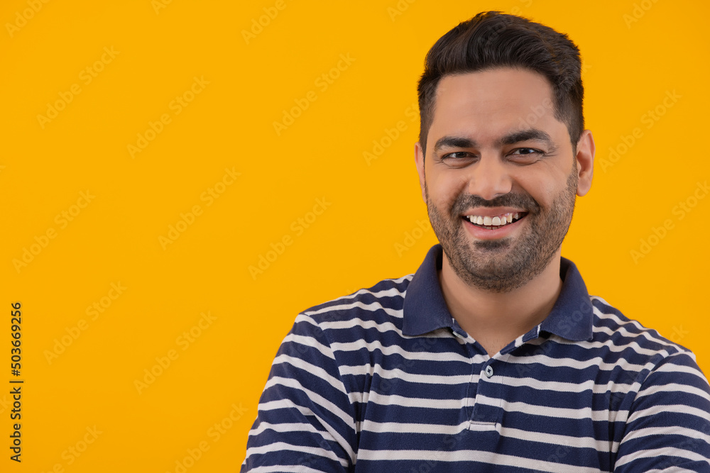 Portrait of happy young man looking at camera Portrait of happy young man looking at camera
