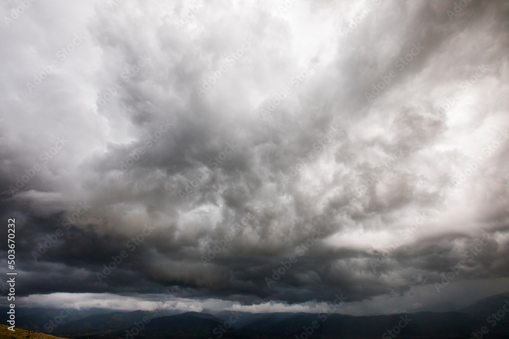 Obraz premium Sunset and dramatic clouds in Cerdanya, Pyrenees, Spain