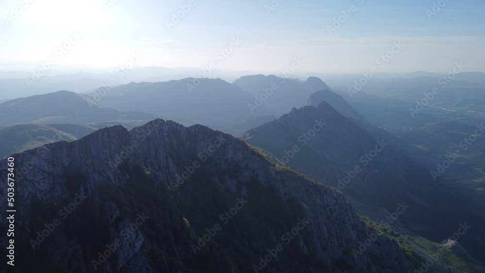 arial view of mountains at sunset in Urkiola Natural Park in the Basque Country, Spain