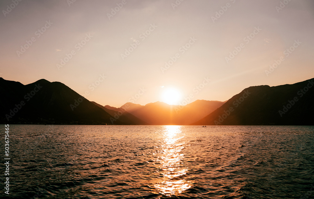 Sea landscape over the blue mountain in sunset. Summer travel vacation concept. - obrazy, fototapety, plakaty 