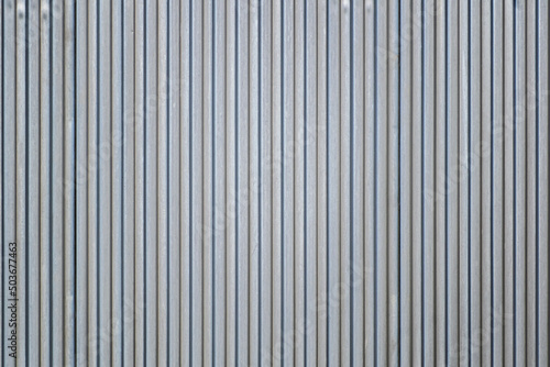 The surface of the corrugated sheet vertically oriented, narrow rows.