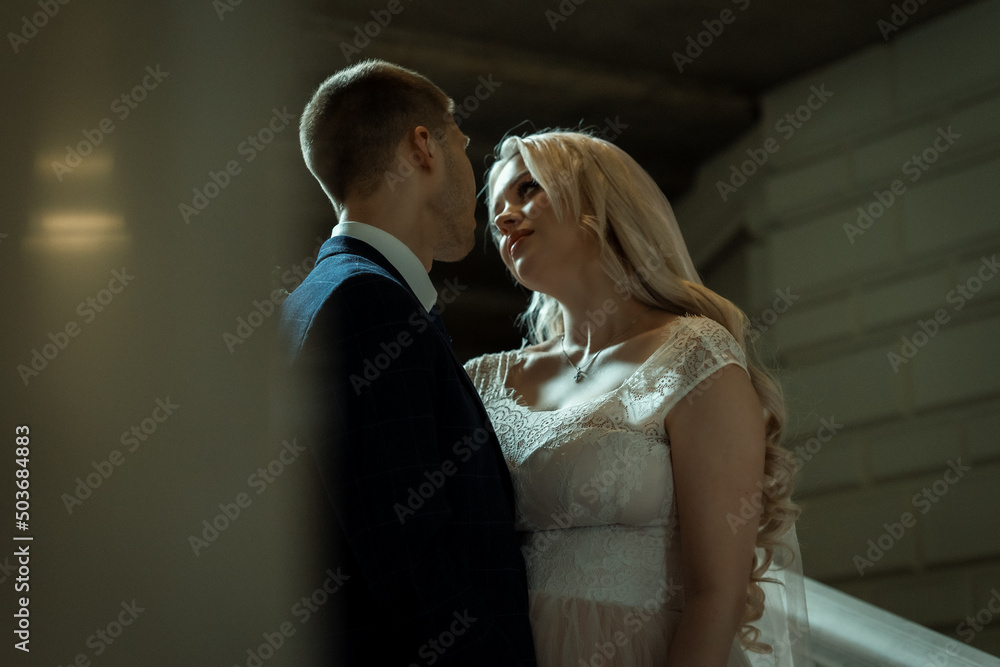 Wedding of a beautiful young couple,couple in love looks one-on-one