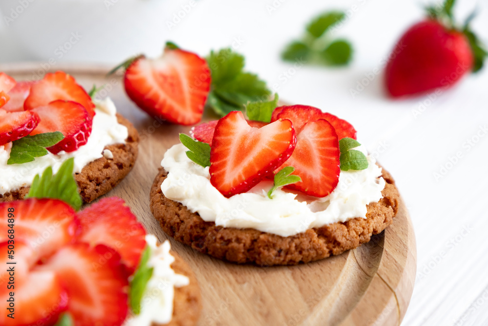 Strawberry tart with whipped cream. Recipe of fast berry cake for breakfast or holiday. Summer dessert. Strawberry tart with whipped cream. Recipe of fast berry cake for breakfast or holiday. Summer dessert.