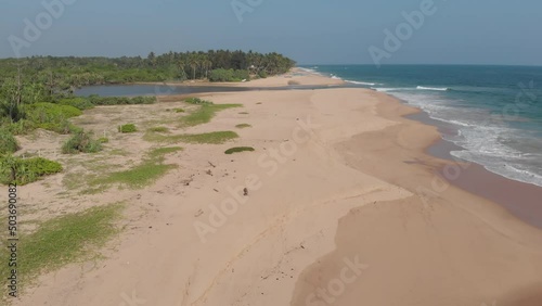 Kahanda Modara beach by drone in Sri Lanka. Along the endless beach. photo