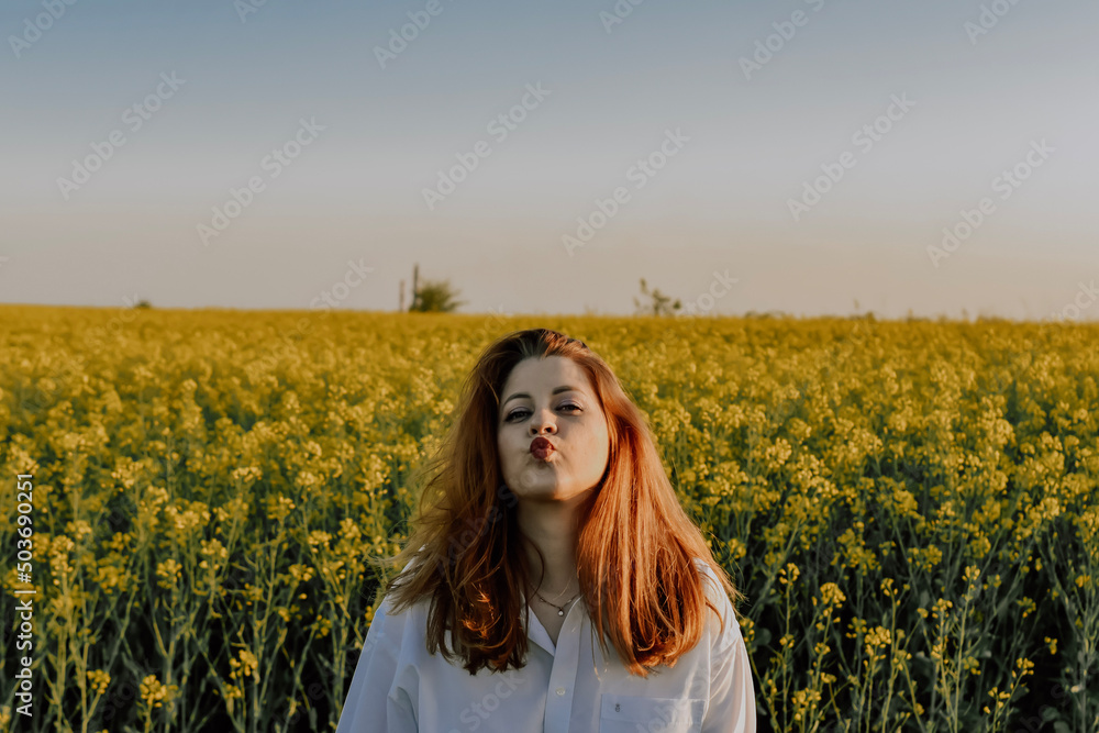 person in a field of sunflowers
