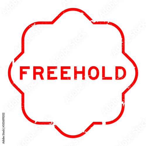 Grunge red freehold word rubber seal stamp on white ckground
