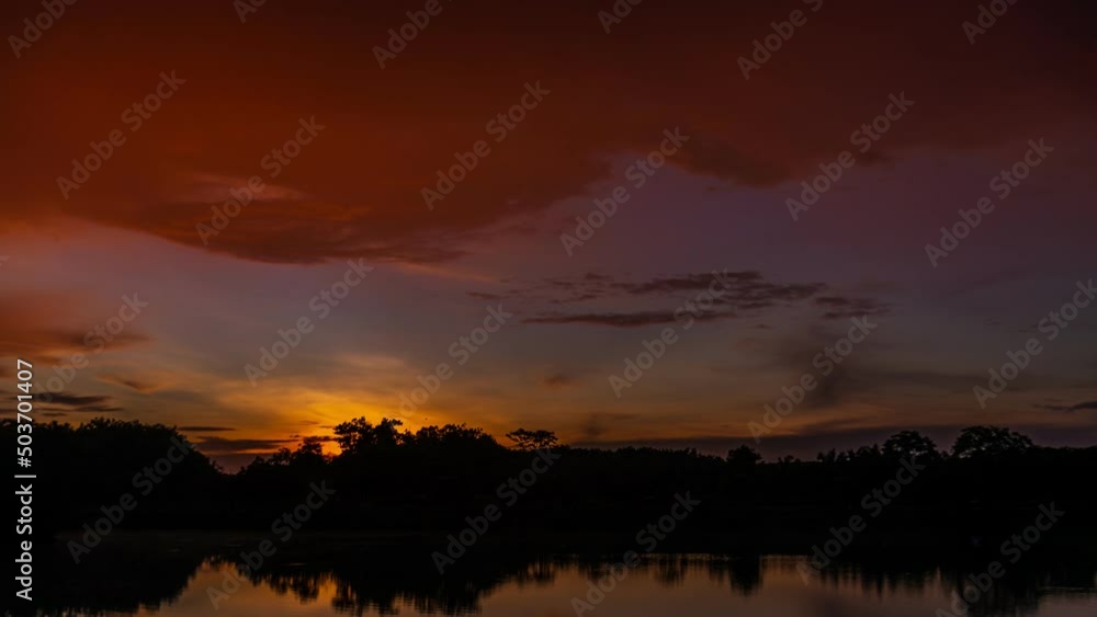 4k Time-lapse, View of Colorful dramatic sky sunset or sunrise with Moving clouds background on River, Time lapse sky with cloud in nature and travel concept. High quality video nature foottage 4k Time-lapse, View of Colorful dramatic sky sunset or sunrise with Moving clouds background on River, Time lapse sky with cloud in nature and travel concept. High quality video nature foottage