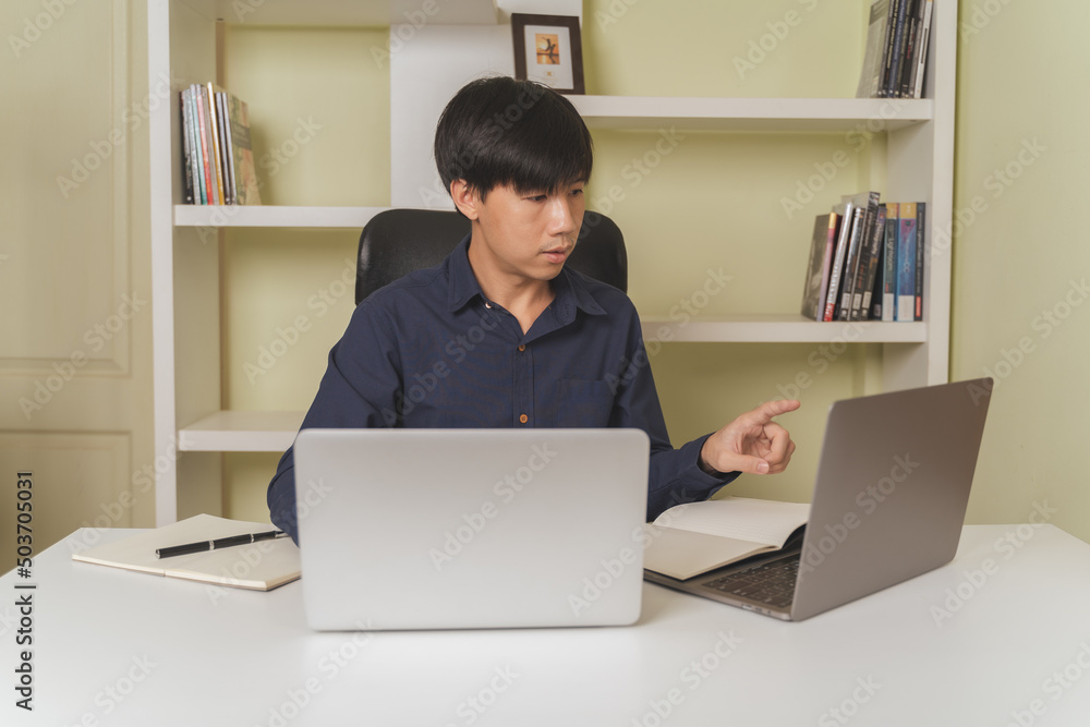 Businessman or investor pointing, using laptop on stock or Cryptocurrency trading for money investing, trading, learning about Crypto or stock trading, investing on online platform. Investing concept. Businessman or investor pointing, using laptop on stock or Cryptocurrency trading for money investing, trading, learning about Crypto or stock trading, investing on online platform. Investing concept.