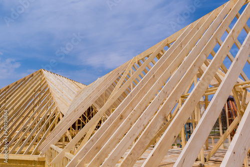 The framed construction of wooden roof a wooden roofing overlap construction photo