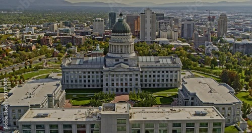 Salt Lake City Utah Aerial v6 dramatic drone low level flyover the dome of historic landmark of state capitol building overlooking at downtown cityscape - Shot with Inspire 2, X7 camera - October 2021 photo