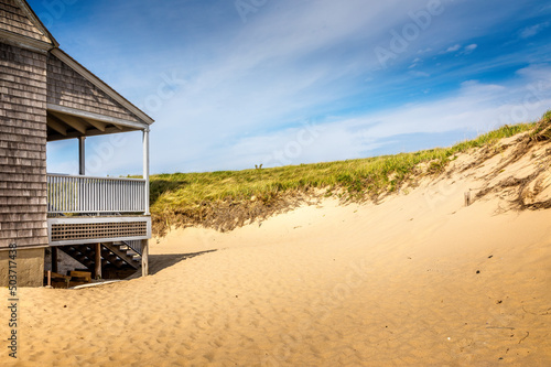 A part of the life saving station building in Provincetown with dand dunes and gras, copy space photo