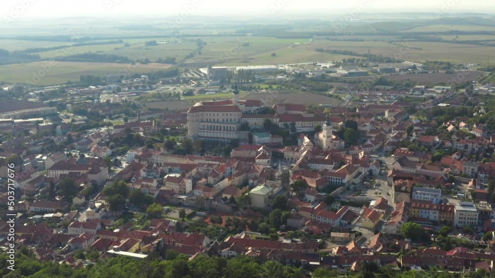Mikulov city center with castle hill and red rooftops, drone shot. Mikulov city center with castle hill and red rooftops, drone shot.