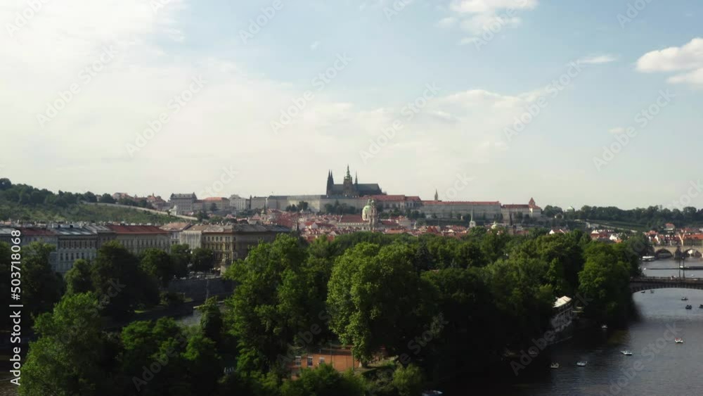 Prague castle above Vltava river and Střelecký island in Czechia, drone.