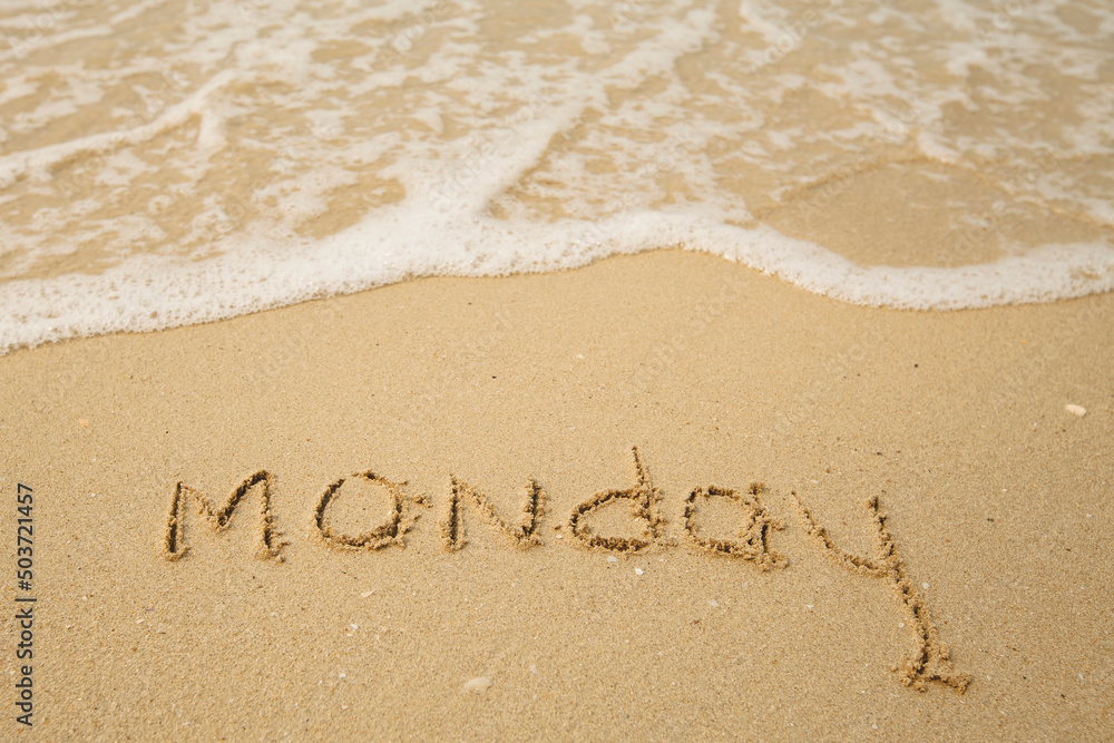 Monday - drawing on the soft beach sand with a soft lapping wave. Monday - drawing on the soft beach sand with a soft lapping wave.