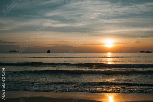 A beautiful sunset on a tropical beach.