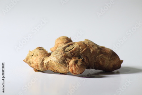 Close up of galangal on a white background