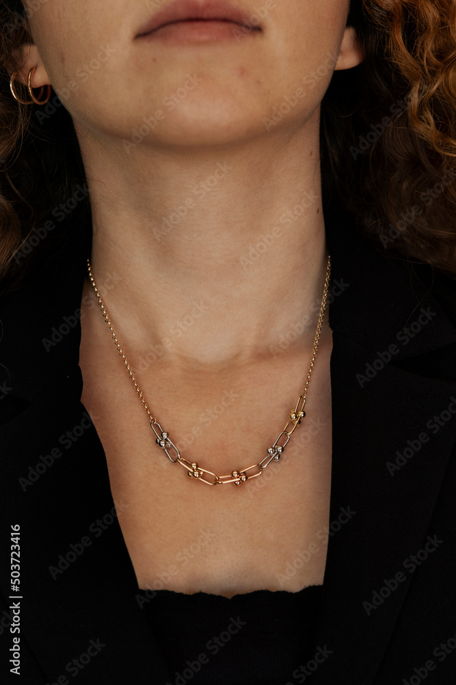 People, fashion, jewelry and luxury concept, closeup of woman wearing luxury jewelry