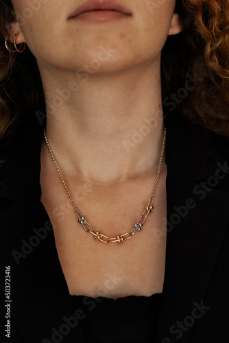 People, fashion, jewelry and luxury concept, closeup of woman wearing luxury jewelry