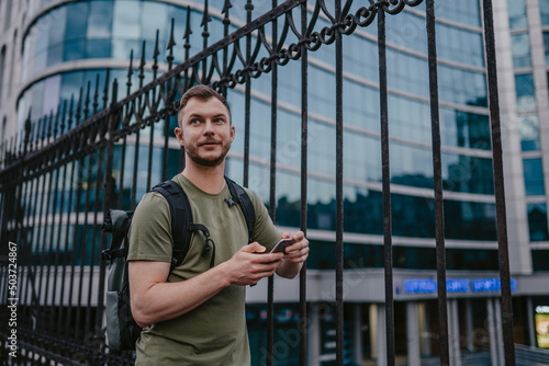 Wallpaper Mural handsome hipster man walking in street Torontodigital.ca
