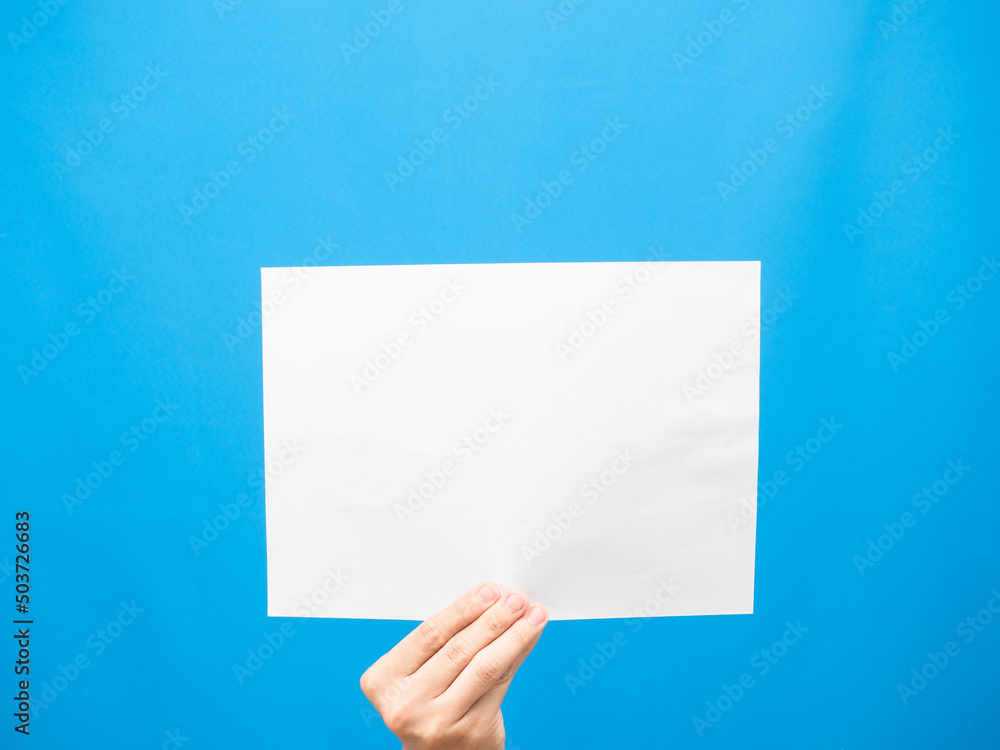 Hand show white paper empty blue background Hand show white paper empty blue background